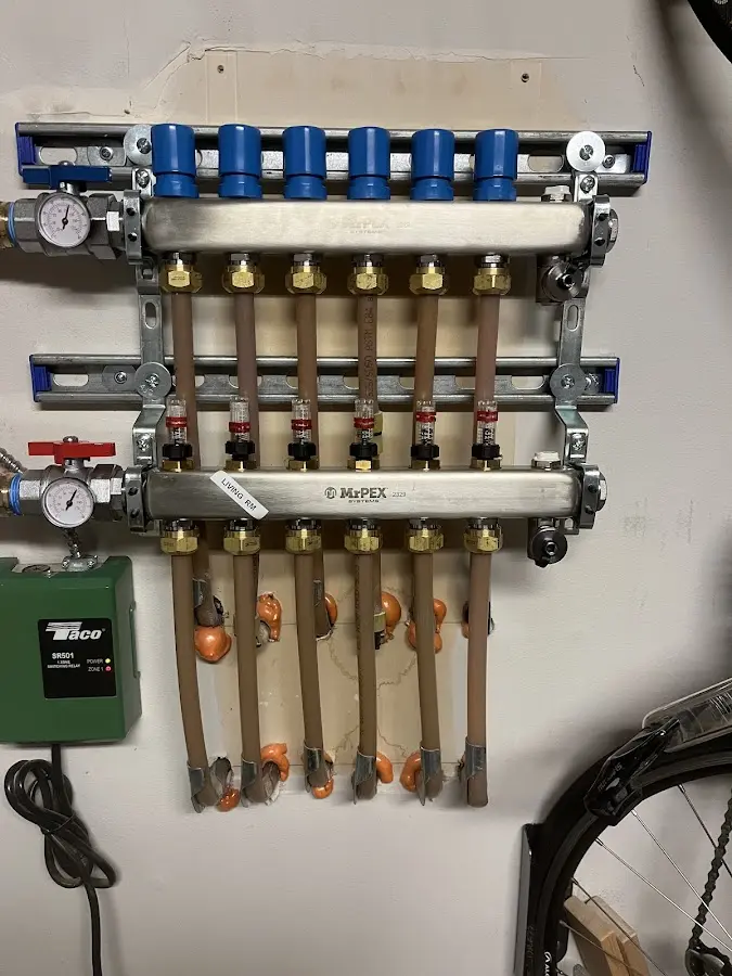 Plumber performing Water Heater Repair at a residential property in Lake Oswego